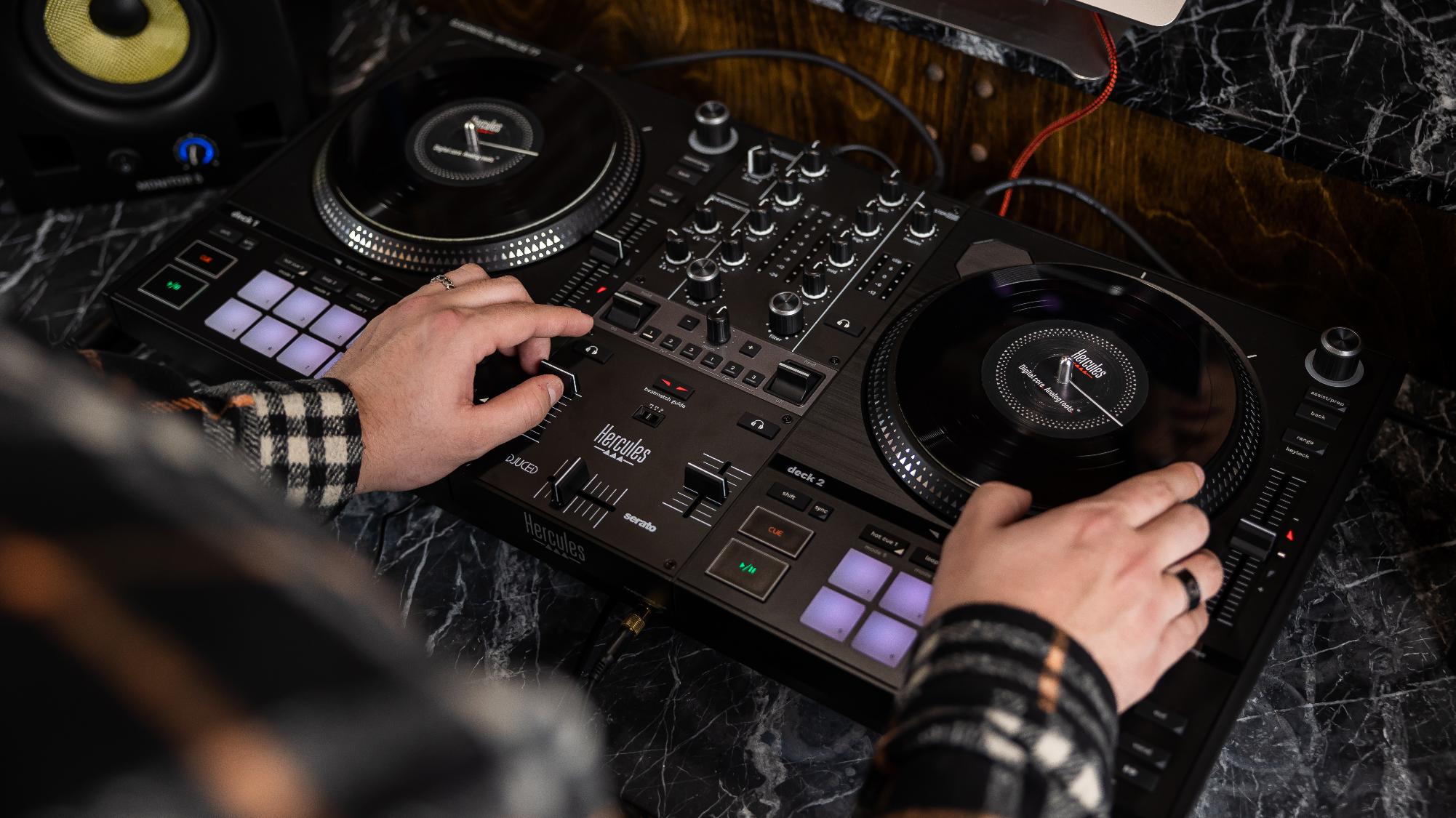 DJ scratching on the Inpulse T7 motorized vinyl platters